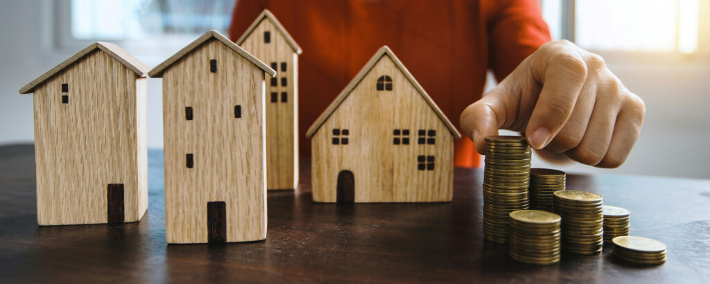 Commercial property portfolio manager comparing operating costs across multiple commercial properties