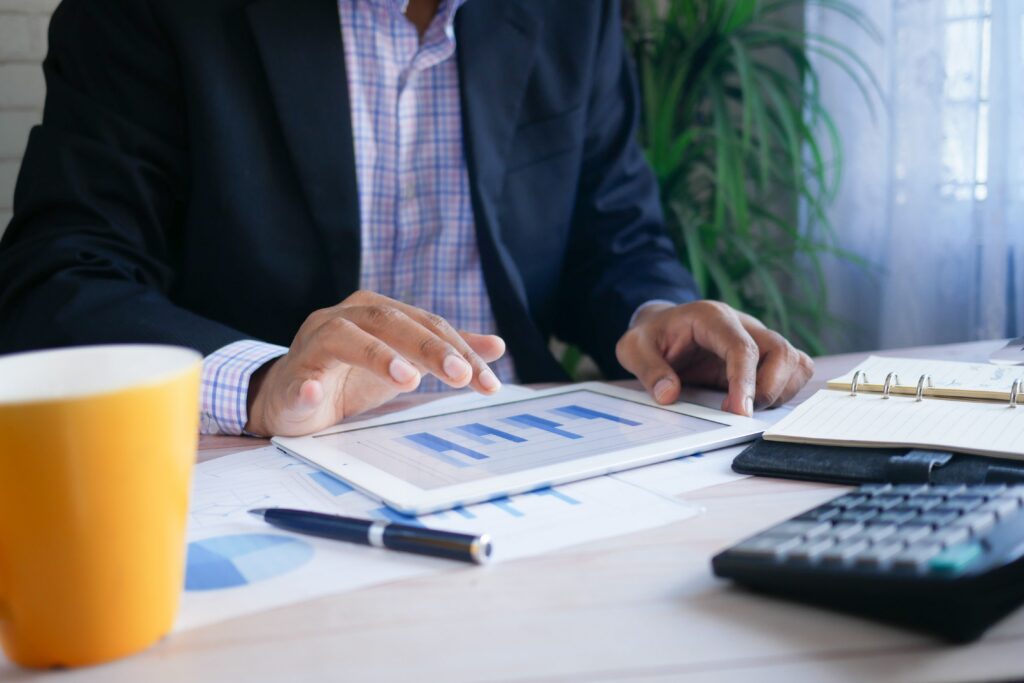 Portfolio property manager analyzing NOI, occupancy and capital expenditure data across multiple commercial assets